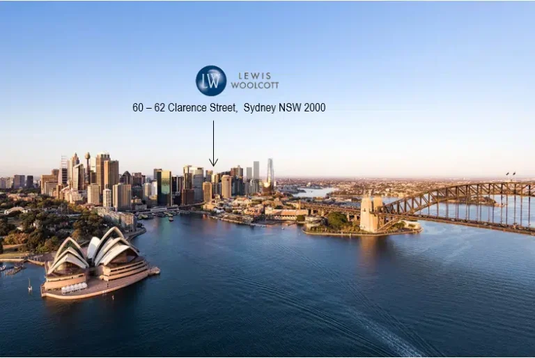 Photograph of Sydney Harbour with an arrow pointing the location of our Sydney office.
