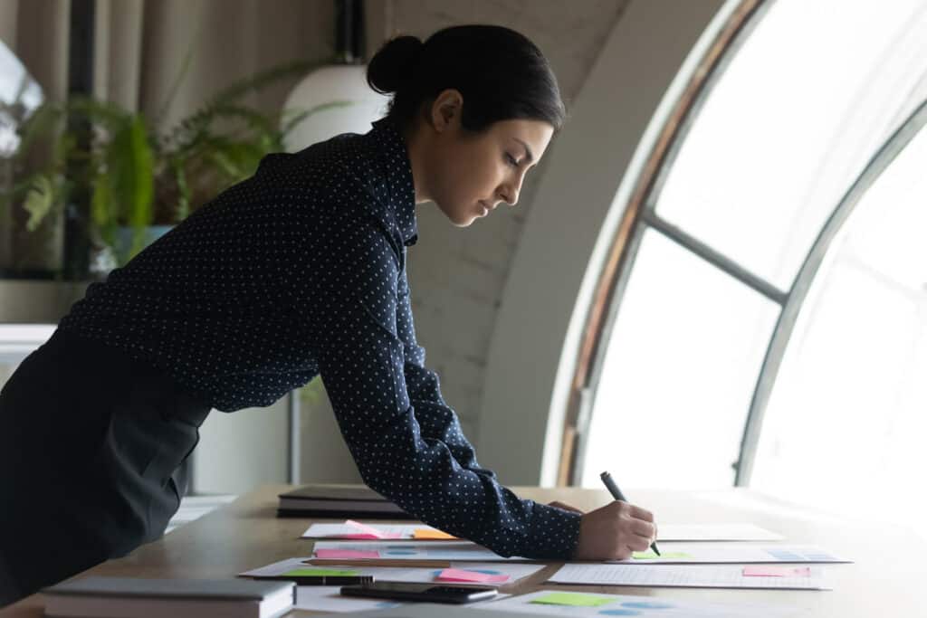 Woman from the energy sector working on paperwork.